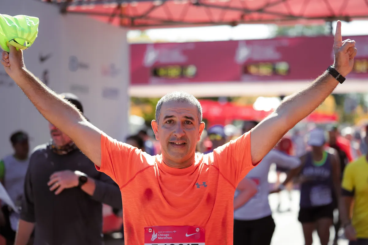 athlete with arms in the air